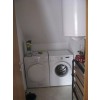 Soba z pralnim in sušilnim strojem